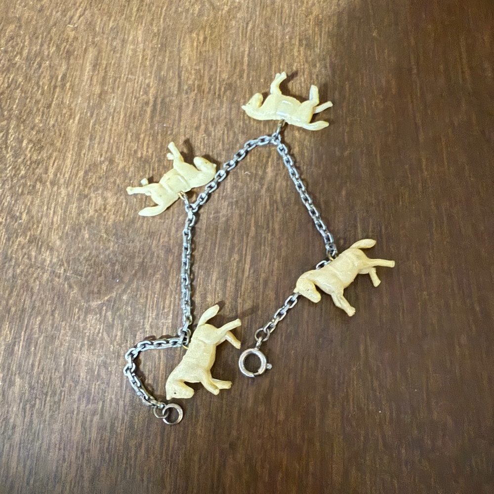 Crackerjack Charm Bracelet With 4 Celluloid Horse Charms Roughly 7"